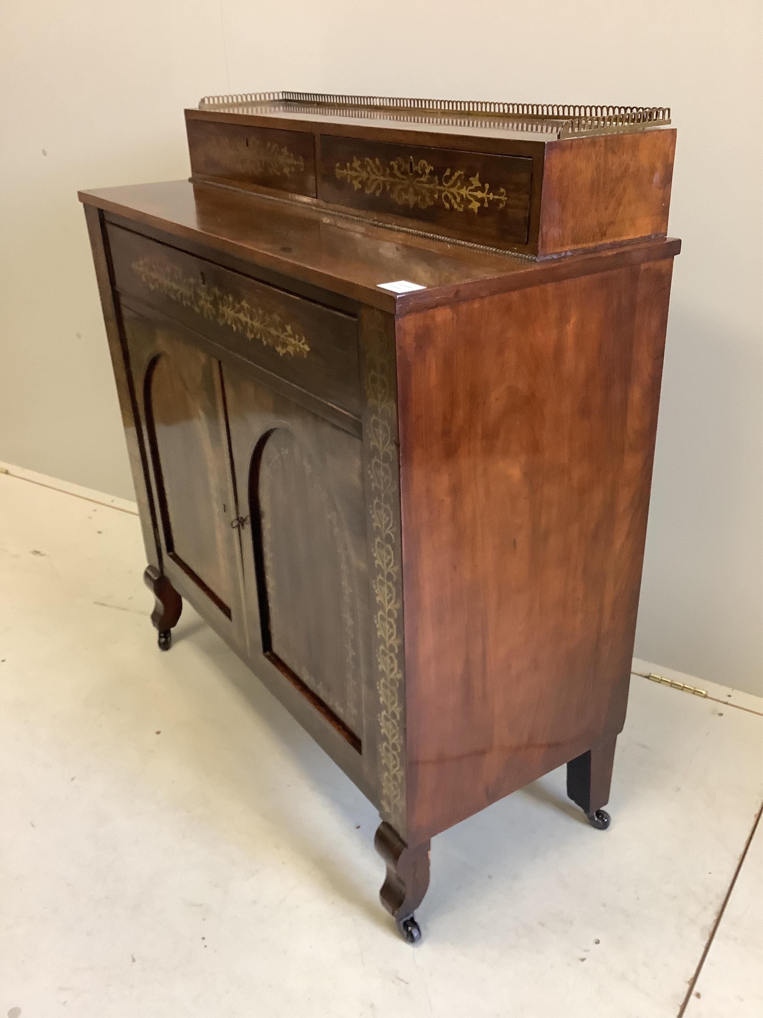 A Regency cut brass inlaid rosewood secretaire cabinet, width 93cm, depth 39cm, height 101cm. Condition - fair